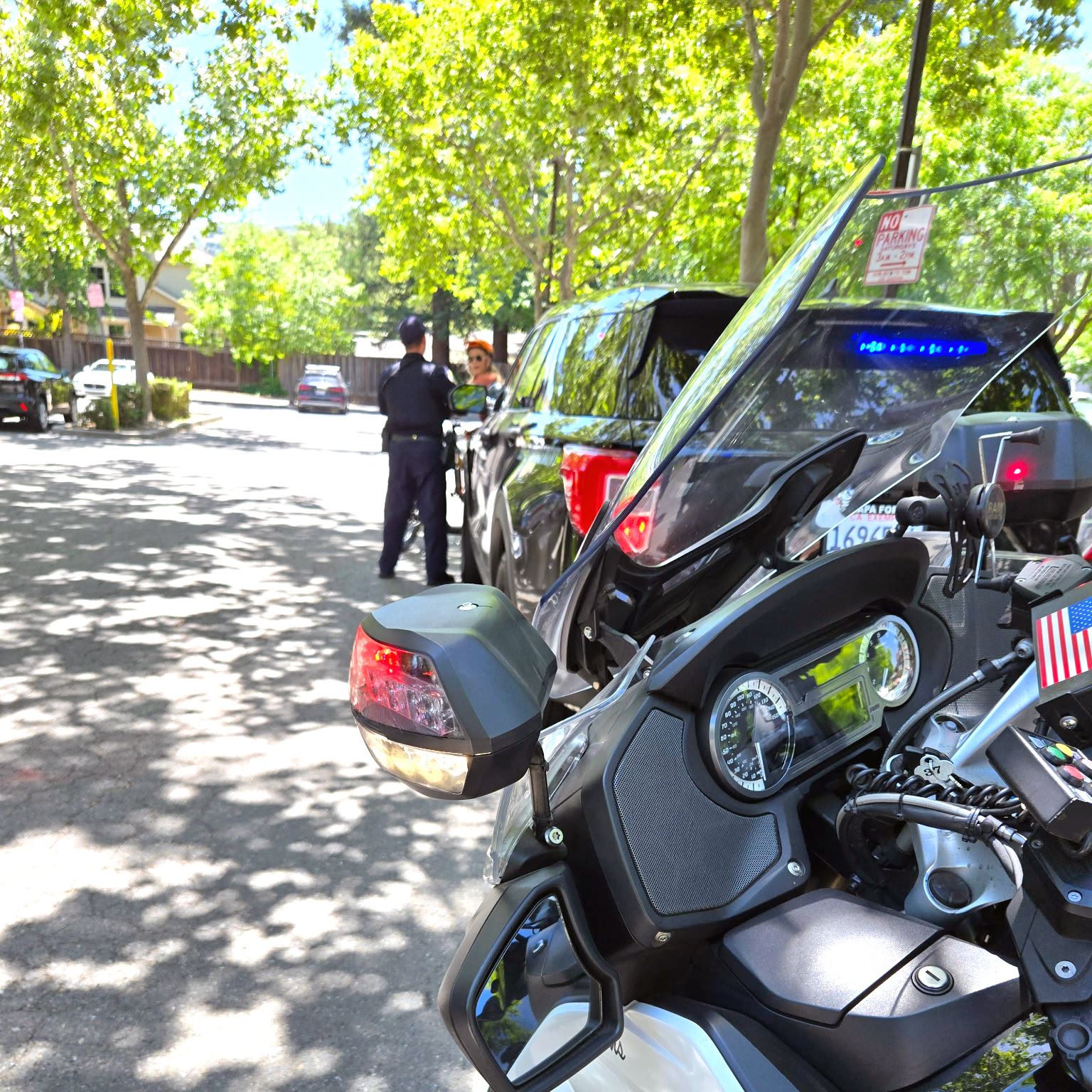 police vehicles topping a bike