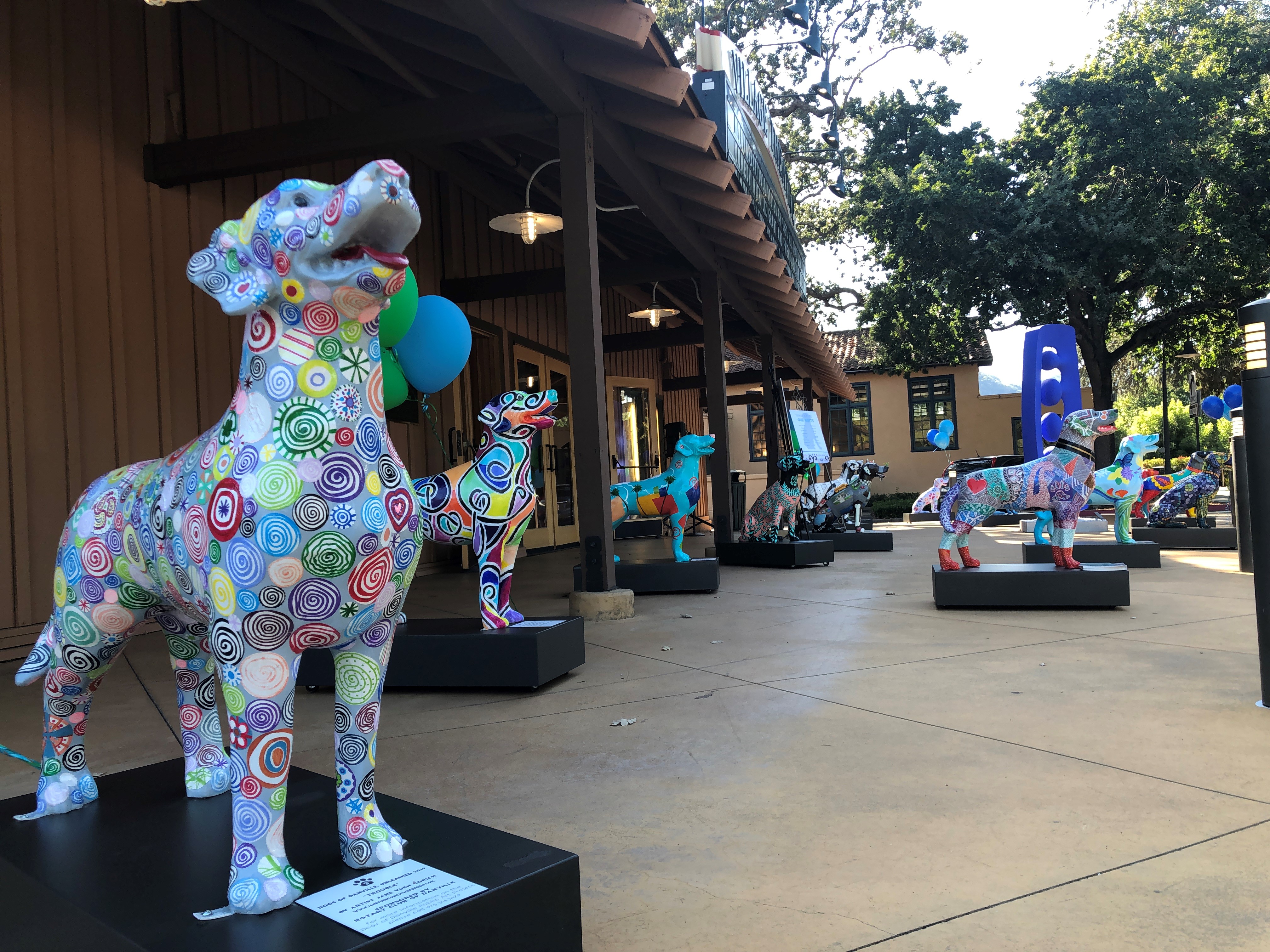 Dogs of Danville all 15 dogs outside the village theatre