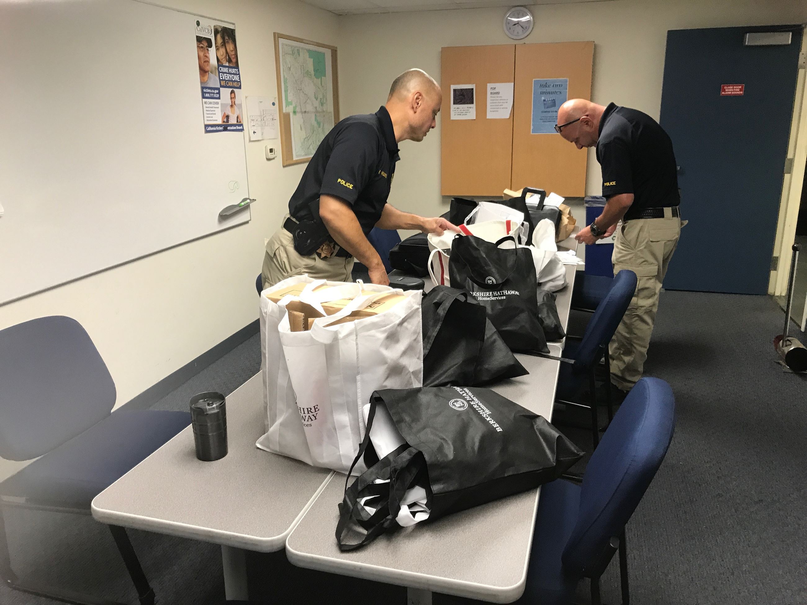 Sergeant Hoekwater and Detective Stapleton pour through mounds of recovered stolen property. 