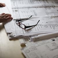Glasses on paperwork